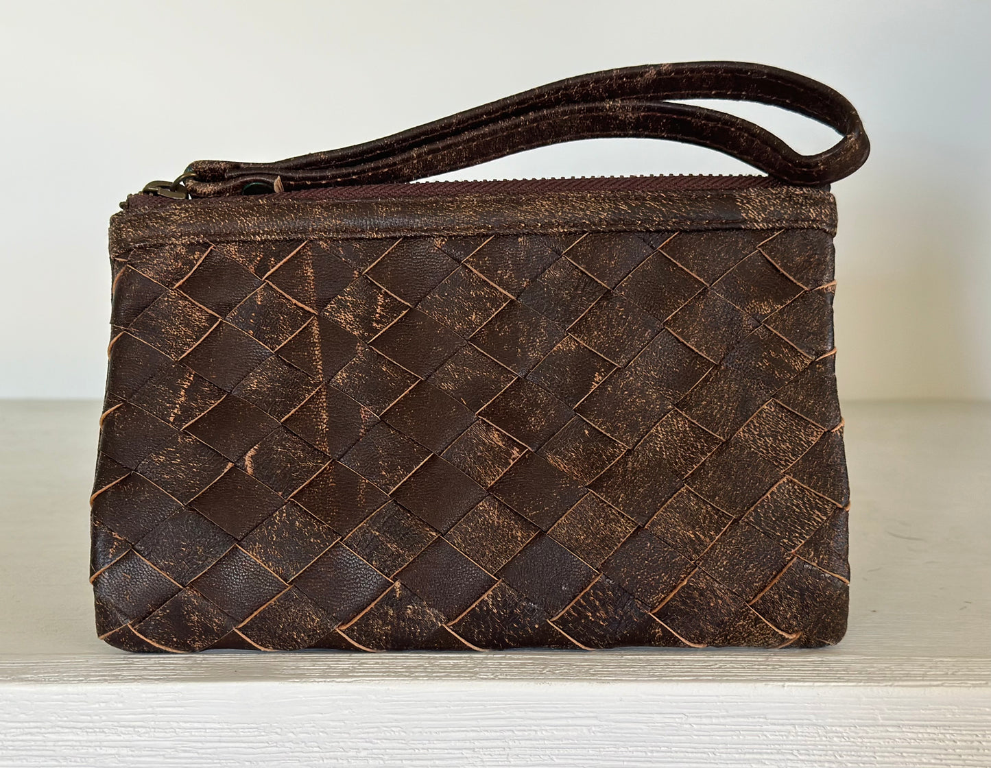 WOVEN LEATHER CLUTCH